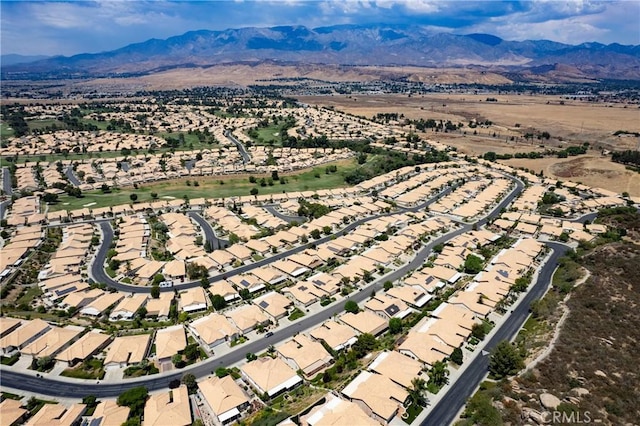 birds eye view of property with a residential view and a mountain view