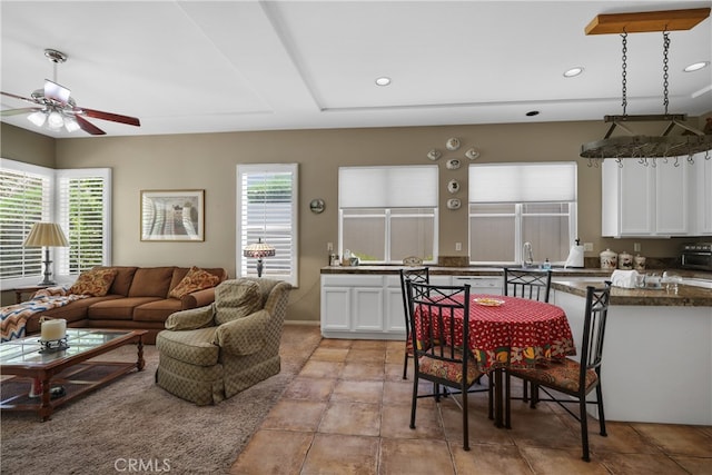 interior space with sink, a wealth of natural light, and ceiling fan