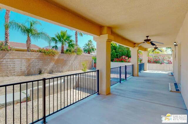 view of patio featuring ceiling fan