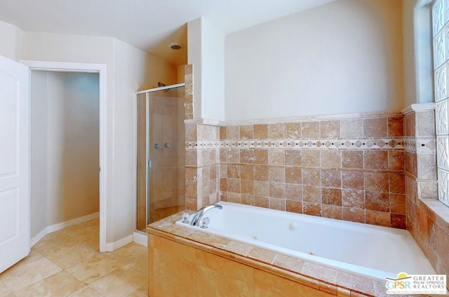 bathroom featuring tile patterned flooring and shower with separate bathtub