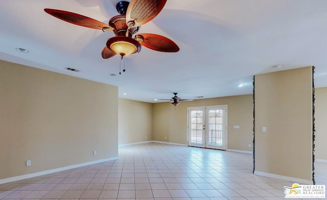 unfurnished room with ceiling fan, light tile patterned floors, and french doors