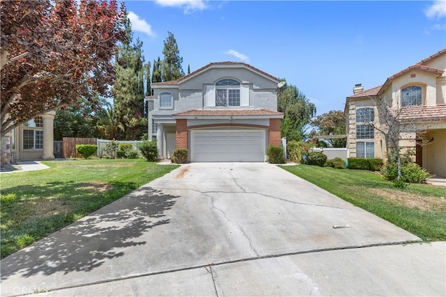 front facade featuring a front yard and a garage