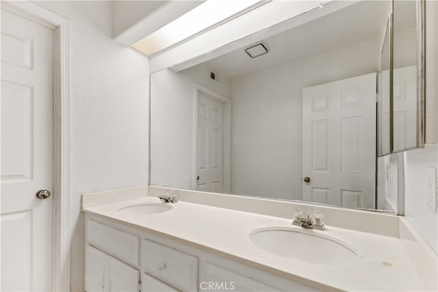 bathroom with double sink vanity