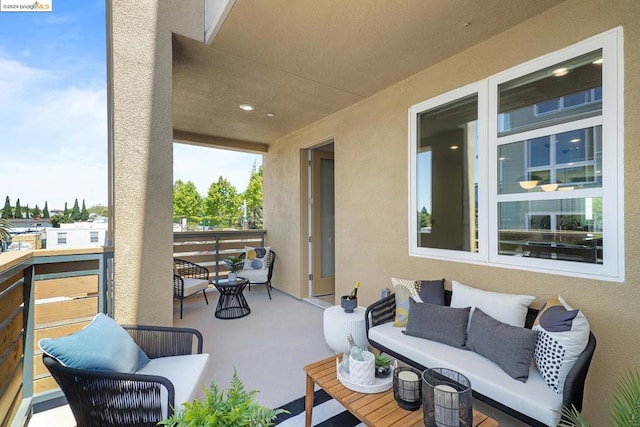 view of patio / terrace featuring an outdoor hangout area and a balcony