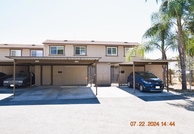 view of front of home featuring a carport