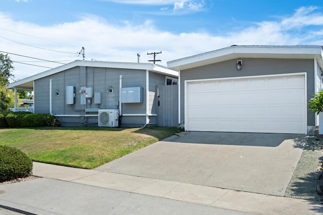 view of front facade featuring a garage and a front yard