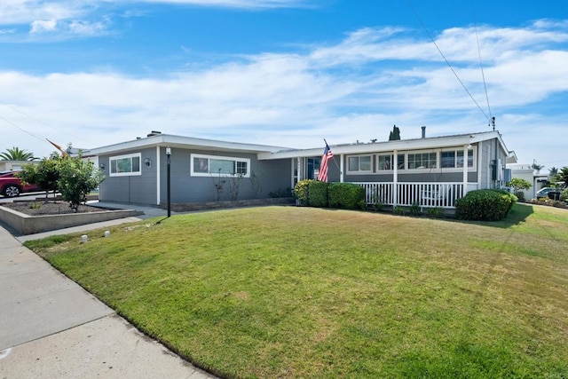 single story home with a front yard