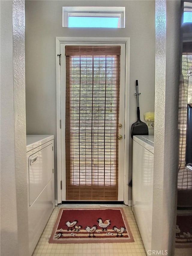 interior space featuring laundry area and washer and dryer