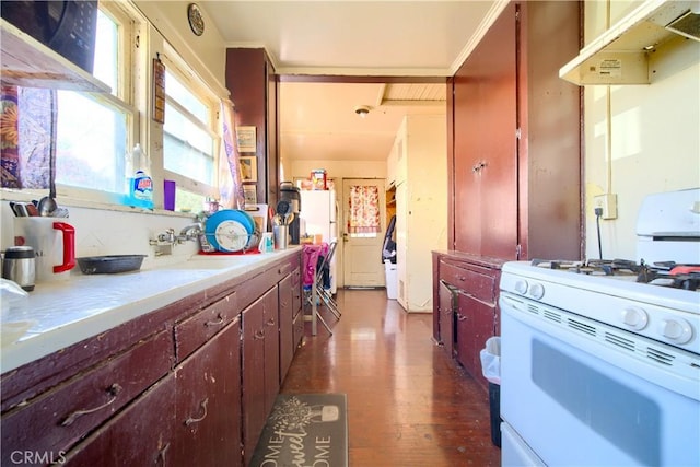 kitchen with sink and white appliances