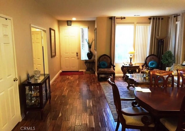 sitting room with dark hardwood / wood-style floors