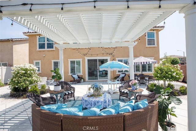 view of patio featuring a pergola