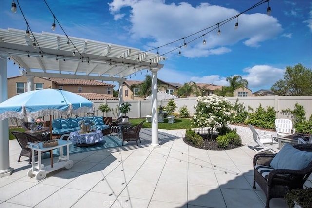 view of patio / terrace with a pergola and an outdoor living space