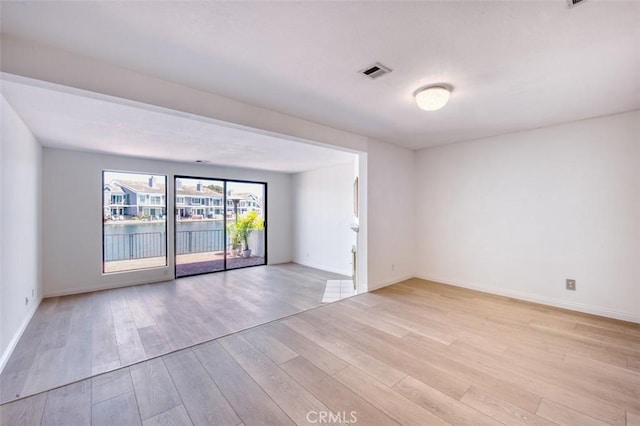 empty room featuring light wood-type flooring