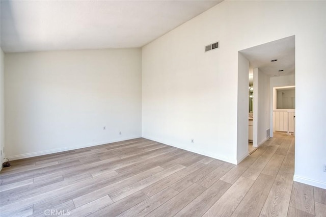 unfurnished room with light hardwood / wood-style flooring