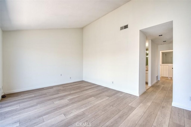 16090 Tortola Cir, Huntington Beach, CA 92649 - empty room with light wood finished floors and baseboards