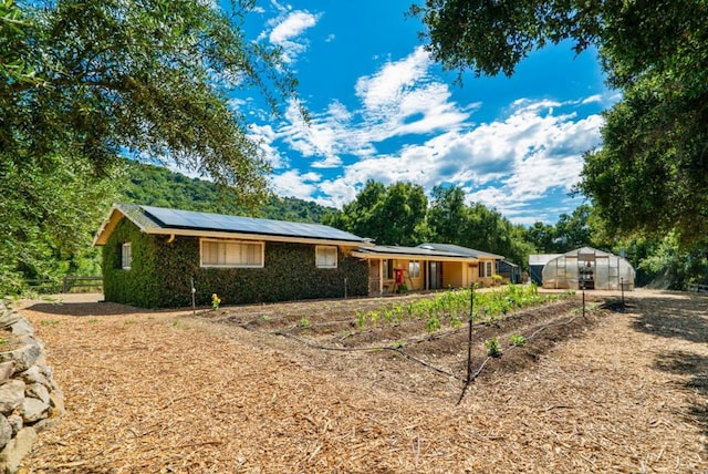 exterior space featuring an outdoor structure