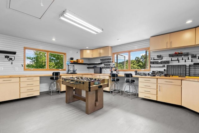 kitchen featuring light brown cabinetry and stainless steel gas stovetop