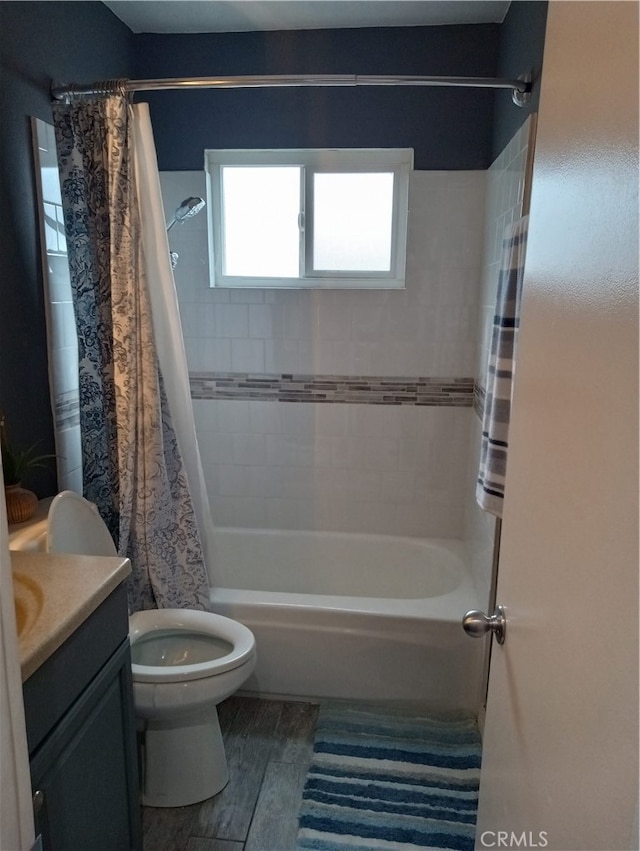 full bathroom featuring vanity, toilet, and shower / bath combo