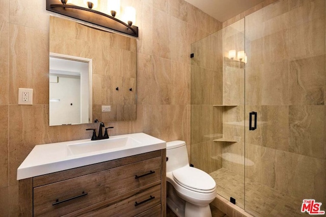 bathroom with toilet, tile walls, and walk in shower