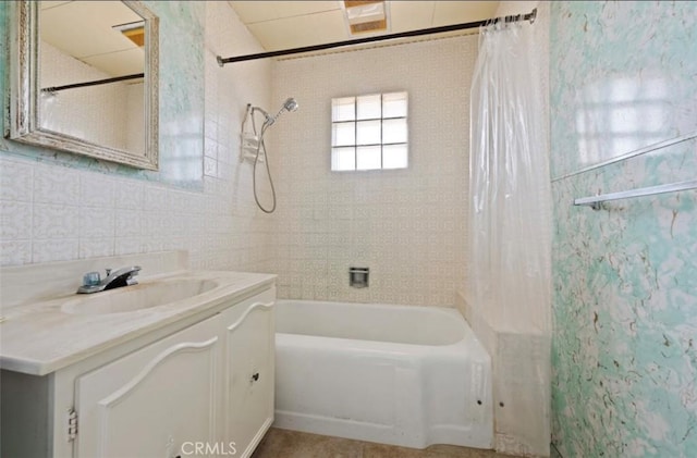 bathroom with vanity and shower / bath combo with shower curtain