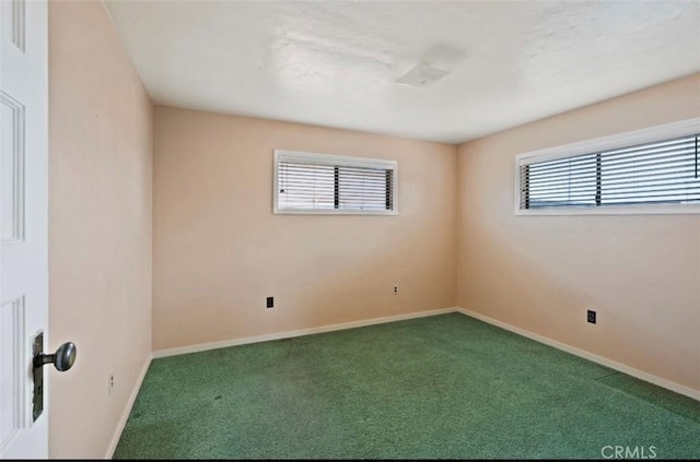 spare room with carpet floors