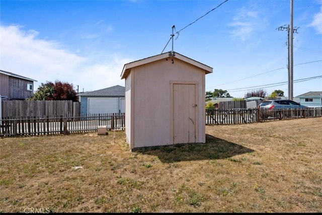 view of outdoor structure featuring a yard