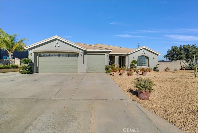 single story home with a garage