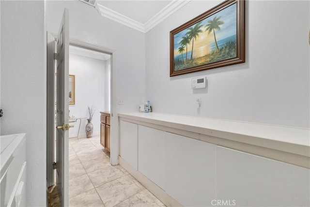 bathroom with ornamental molding and tile patterned floors