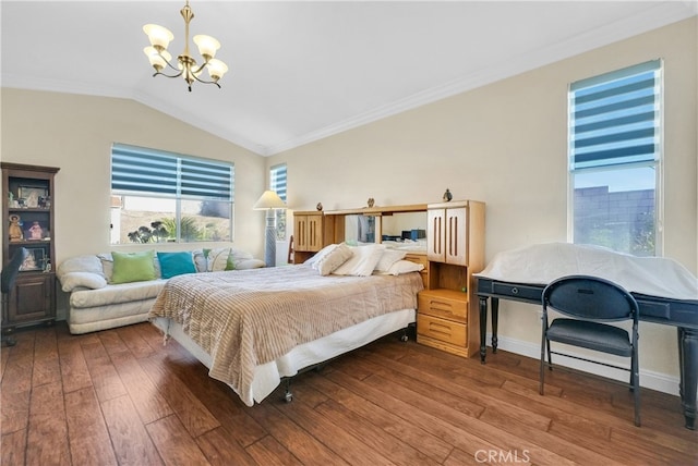 bedroom featuring wood-type flooring, vaulted ceiling, a notable chandelier, and crown molding