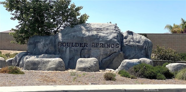 view of community sign