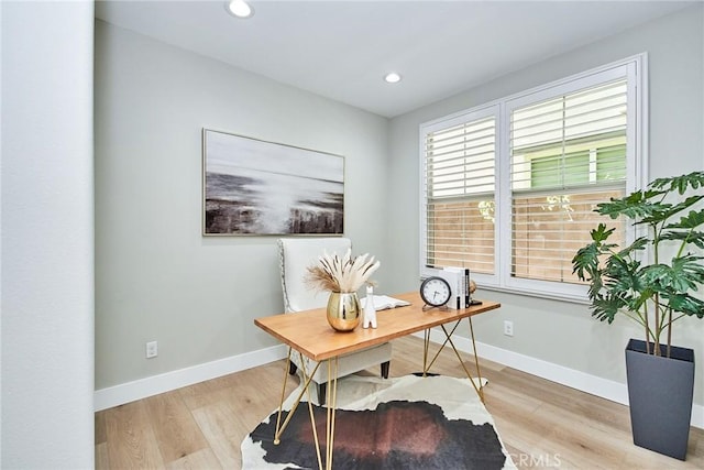 home office featuring recessed lighting, light wood-style flooring, and baseboards