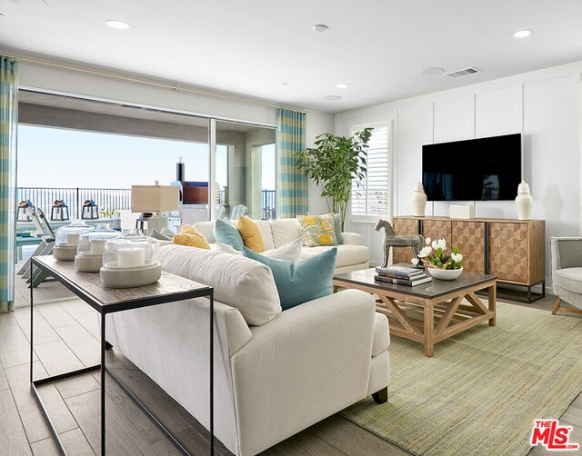 living room with wood-type flooring