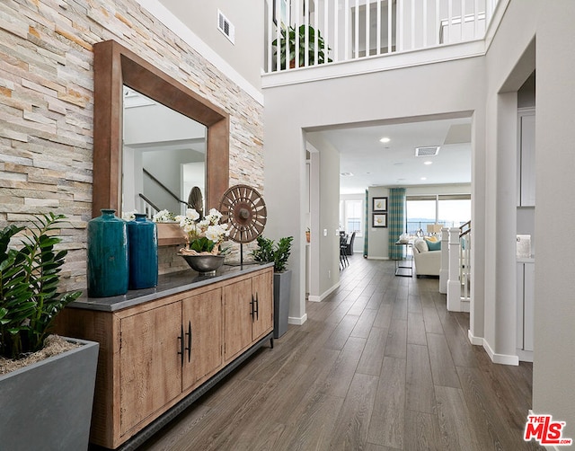 hallway featuring dark hardwood / wood-style flooring