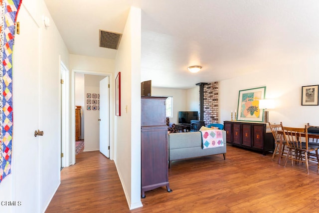 hall with dark hardwood / wood-style floors