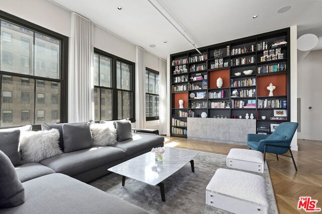 sitting room featuring light parquet floors