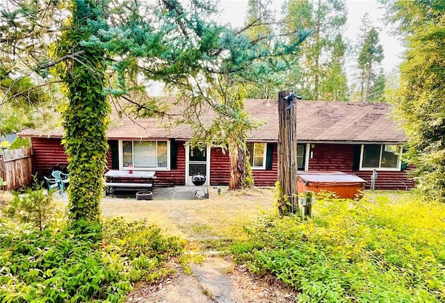 view of front of home with a hot tub