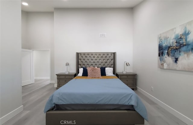 bedroom featuring light hardwood / wood-style flooring