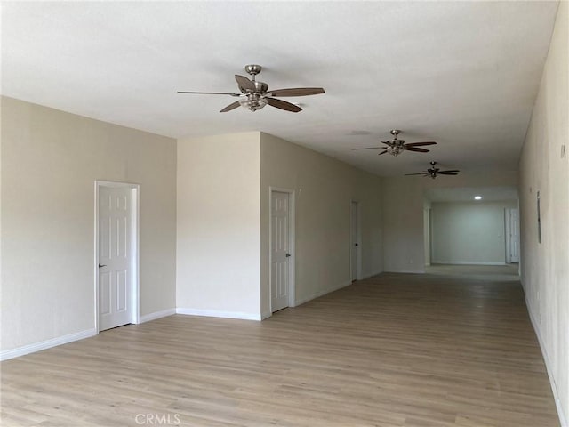 unfurnished room with light hardwood / wood-style flooring