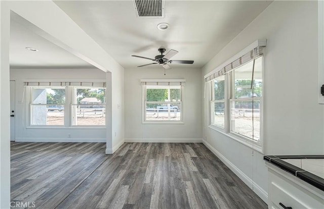 interior space featuring ceiling fan