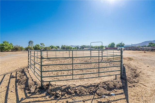 view of gate featuring a rural view