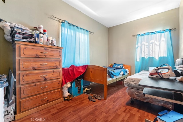 bedroom featuring hardwood / wood-style flooring