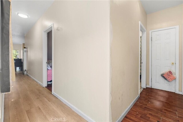 corridor featuring hardwood / wood-style flooring