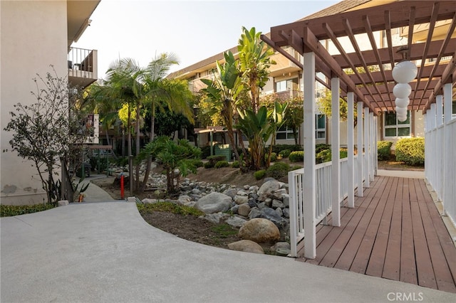 surrounding community with a pergola