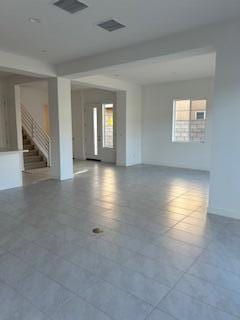 view of tiled spare room