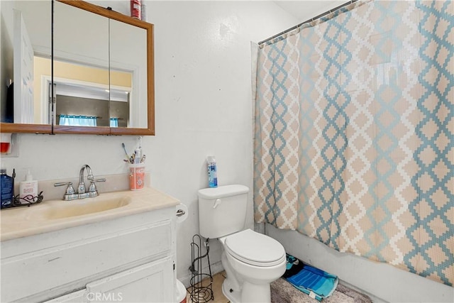 10406 Avalon Blvd, Los Angeles, CA 90003 - full bathroom featuring shower / bath combo with shower curtain, toilet, and vanity