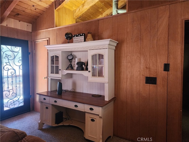 office space featuring carpet flooring, a healthy amount of sunlight, lofted ceiling, and wooden ceiling