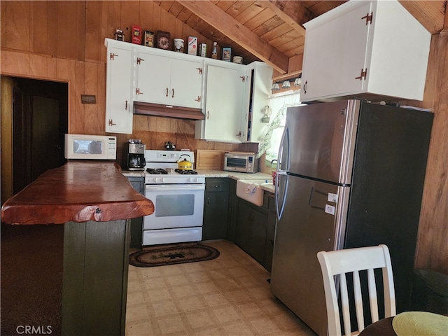 kitchen with light tile patterned flooring, white appliances, premium range hood, wood ceiling, and lofted ceiling with beams