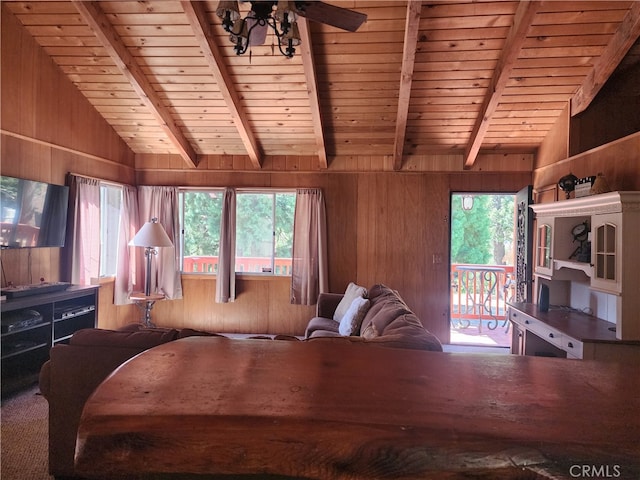 living room featuring wooden ceiling and wooden walls