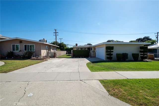 ranch-style house with a front yard and a garage