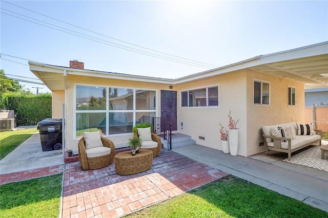 rear view of house featuring a patio area